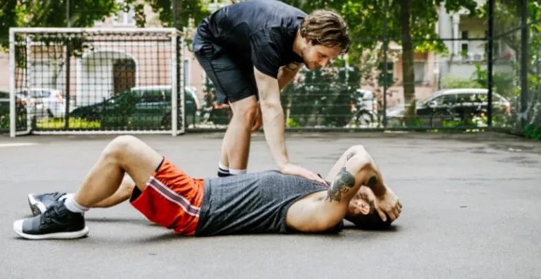 Symptoms of a Sprained Ankle — District Wellness